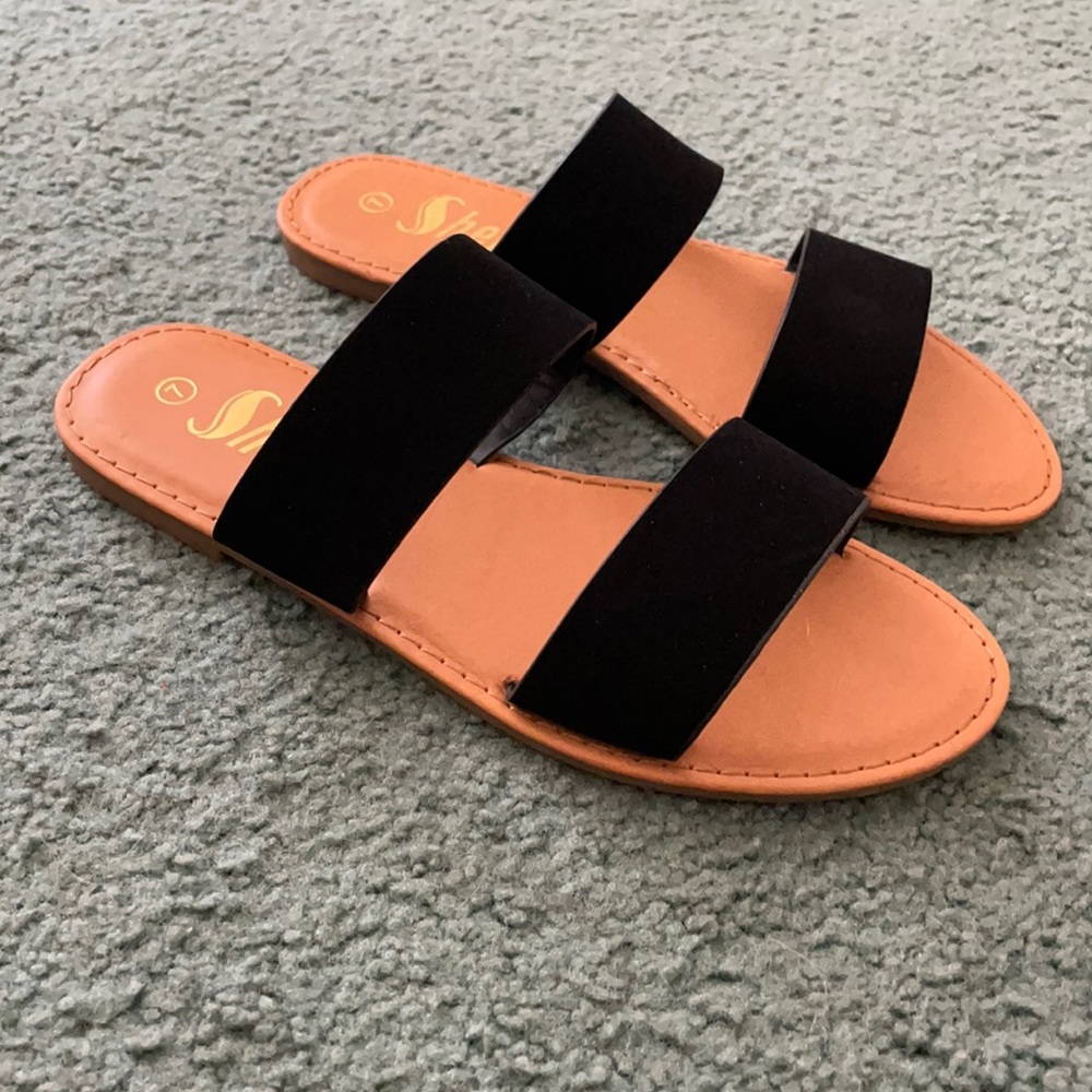 BRAND NEW. Black strapped sandals